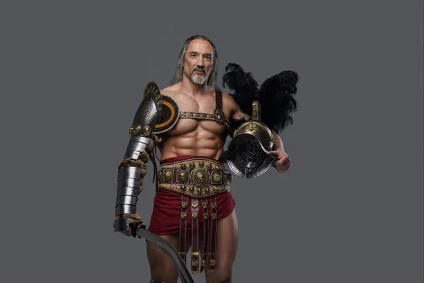 This regal, aged gladiator exudes strength and dignity in sleek, lightweight armor, holding a gladius sword and helmet against a grey background