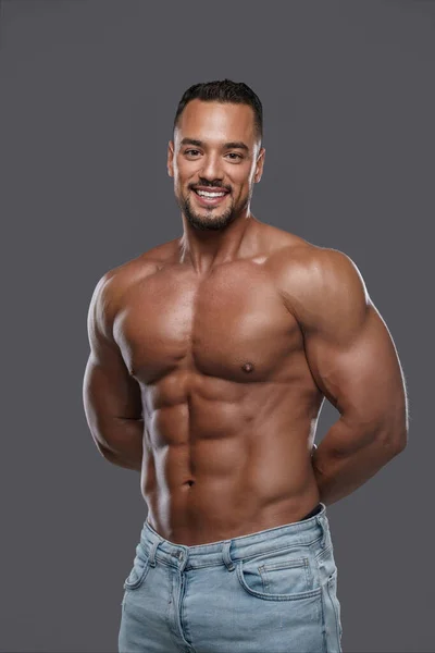 Charming Muscular Male Model Dazzling Smile Poses Shirtless Neutral Grey — Stock Photo, Image
