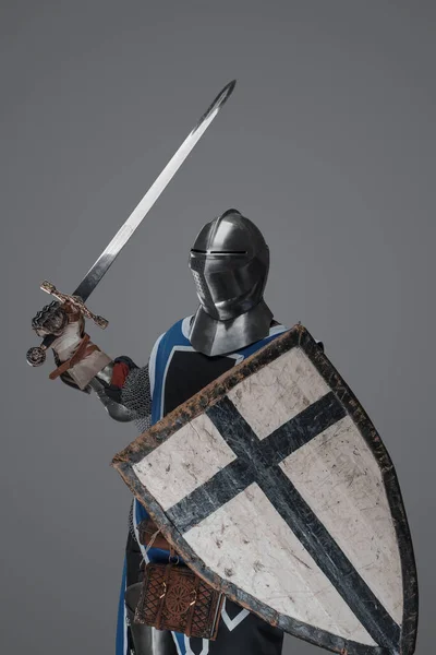 Brave Medieval Warrior Dressed Armor Blue Surcoat Waving His Sword — Zdjęcie stockowe
