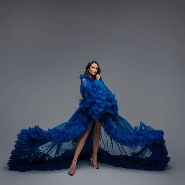 Stunning Model Lush Blue Carnival Gown Poses Elegantly Gray Backdrop — Stock Photo, Image