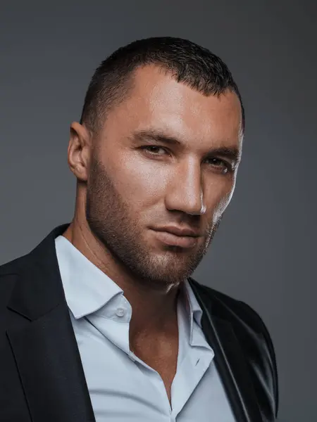 stock image Close-up of a confident male in formal wear with a piercing look