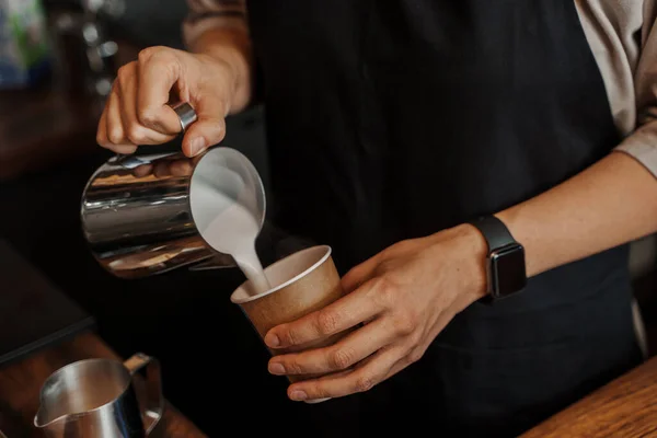 Close Baristas Hands Pouring Frothed Milk Paper Coffee Cup Blurred — Stock Photo, Image