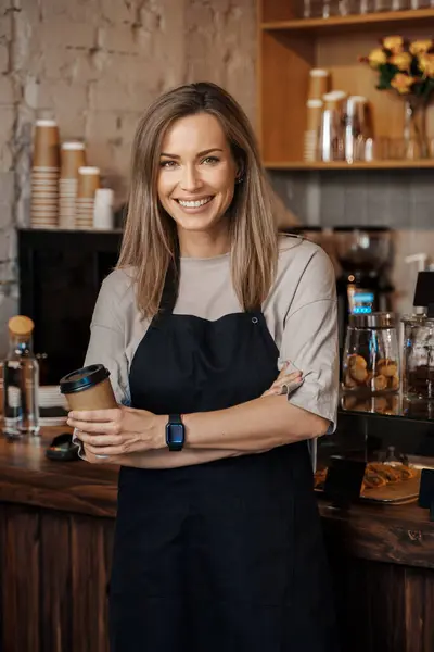 Portrait Poised Female Barista Holding Takeaway Coffee Cup Standing Her Stock Picture