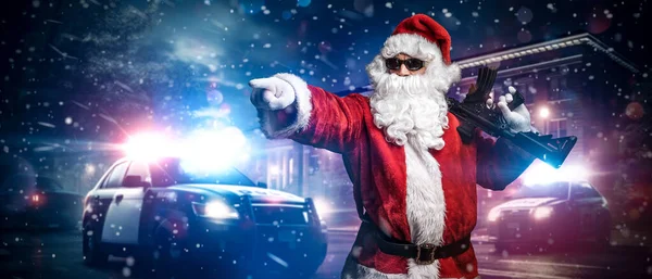 Santa Claus Holding Machine Gun Points His Finger Somewhere Posing — Stock Photo, Image