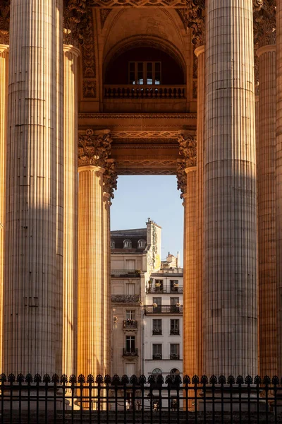 Columns of the Pantheon building in Paris on a sunny day, sunset time. France