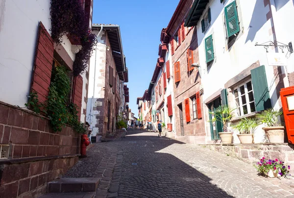 stock image Saint Jean Pied de Port, France - July 27, 2022: Alignment of typical houses of Saint Jean Pied de Port , most beautiful Village in France along the Way of St. James