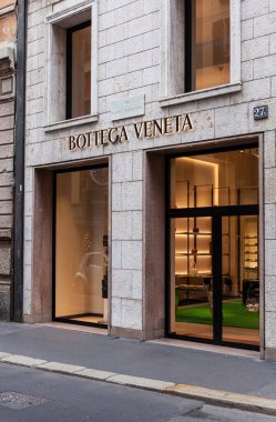Milan, Italy - Ottobre 16, 2022: The Bottega Veneta boutique in Montenapoleone, Milan is a luxury fashion destination for the latest high-end fashion. The store offers clothing, shoes, and accessories from the renowned designer brand
