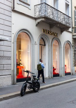 Milan, Italy - Ottobre 16, 2022: The Versace store in Montenapoleone, Milan is a luxury fashion destination for the latest high-end fashion. The store offers clothing, shoes, and accessories from the renowned designer brand