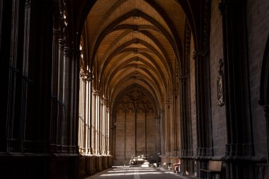 View of the ornate gothic cloister arcade arches of the Catholic Cathedral de Santa Maria la Real, 15th Century Gothic Cathedral, Pamplona. Navarre, Spain