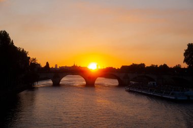 View of the famous bridge called Pont Royal at sunset, Paris