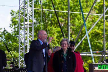 Gattatico, Reggio Emilia, Italy - April 25, 2023: Stefano Bonaccini Governor of the Emilia Romagna Region speaking with the audience during the Liberation Day at the 25 April concert