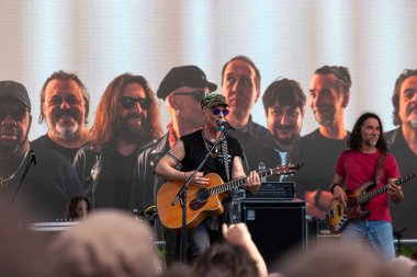 Reggio Emilia, Italy - April 25, 2023: Alessandro Finazzo, called Finaz lead guitarist of the folk-rock band Bandabard during the 25 April concert