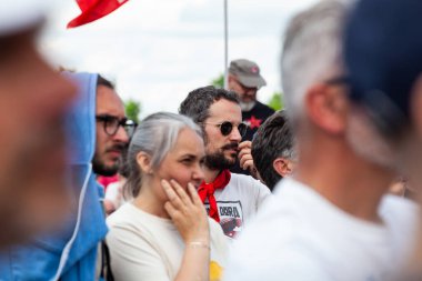 Gattatico, Reggio Emilia, Italy - April 25, 2023: People watching concert in the park at open air during the Liberation Day at the 25 April concert