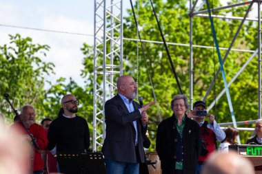 Gattatico, Reggio Emilia, Italy - April 25, 2023: Stefano Bonaccini Governor of the Emilia Romagna Region speaking with the audience during the Liberation Day at the 25 April concert