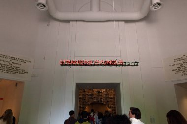 Venice, Italy - April 18, 2024: Installation by Claire Fontaine titled Foreigners Everywhere/Stranieri Ovunque at the Entrance of the Central Pavilion for the 60th International Art exhibition of Venice biennale clipart