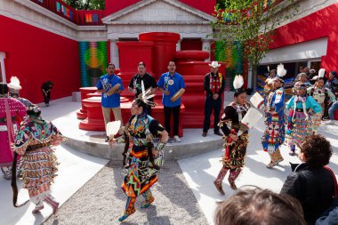 Venice, Italy - April 19, 2024: Opening programs were performed by Colorado Inter-Tribal Dancers; Oklahoma Fancy Dancers; Anthony Hudson/Carla Rossi as Drag Clown in Residence, Confederated Tribes of Grande Ronde and Siletz; Tribal Chief Cyrus Ben, M clipart