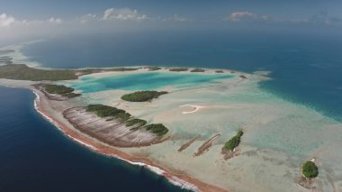 Breathtaking aerial perspective of Rangiroa island, the largest atoll in Tuamotus. Vibrant turquoise lagoon, intricate coral reefs, and abundant greenery. Remote untouched places, travel destination clipart