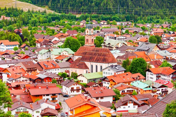 stock image The Roman Catholic parish church of St. Peter and Paul aerial panoramic view, Mittenwald in the Upper Bavarian district of Garmisch-Partenkirchen, Germany