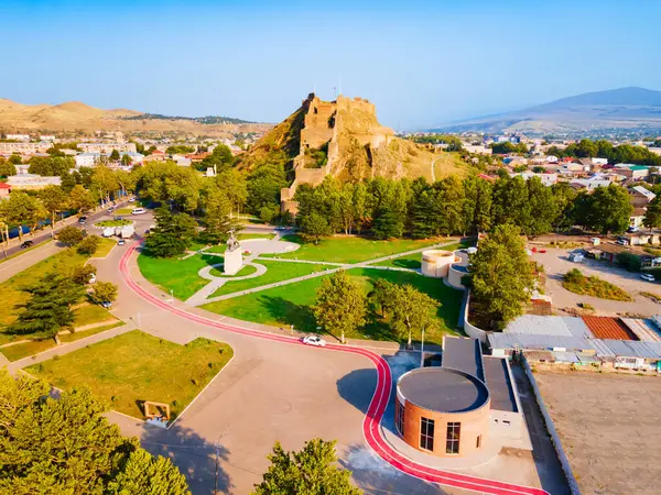 stock image Gori Fortress or Goris Tsikhe aerial panoramic view, Georgia. It is a medieval citadel in Georgia, situated above the city of Gori on a rocky hill.