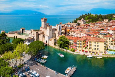 Scaligero Castle aerial panoramic view. Scaligero Castle is a fortress in the historical center of Sirmione town at the Garda Lake in Italy clipart