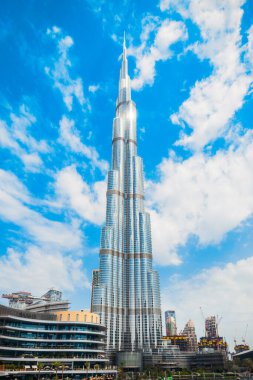 DUBAI, UAE - FEBRUARY 25, 2019: Burj Khalifa or Khalifa Tower is a skyscraper and the tallest building in the world in Dubai, UAE clipart