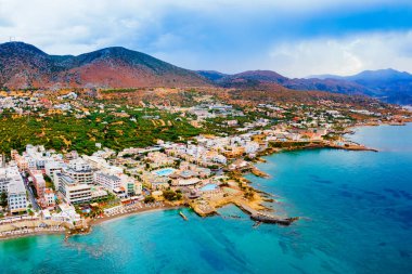 Hersonissos harbor aerial panoramic view. Hersonissos or Chersonissos is a town in the north of Crete island in Greece. clipart