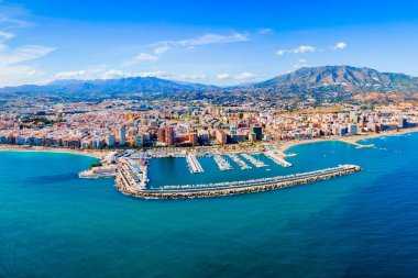 Fuengirola city beach and marina aerial panoramic view. Fuengirola is a city on the Costa del Sol in the province of Malaga in the Andalusia, Spain. clipart