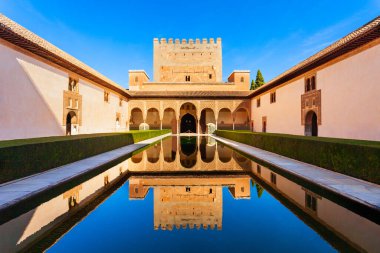 The Court of the Myrtles is the central part of the Comares Palace inside the Alhambra palace complex in Granada, Spain clipart