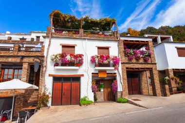 Beauty building in Capileira village. Capileira is the highest village in the Alpujarras area in the province of Granada in Andalusia, Spain. clipart