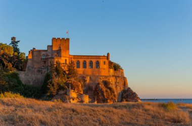 Castle Sao Joao do Arade in Ferragudo in the Algarve. Portugal clipart