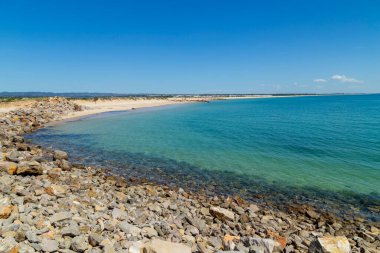 Beautiful empty beach in Algarve south coast, near Faro, Portugal