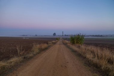 Misty rural landscape at sunrise in Andalusia, Spain.