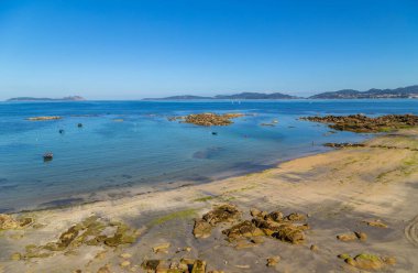 Vigo, Spain: People in Samil beach in a summer day, Vigo. Spain