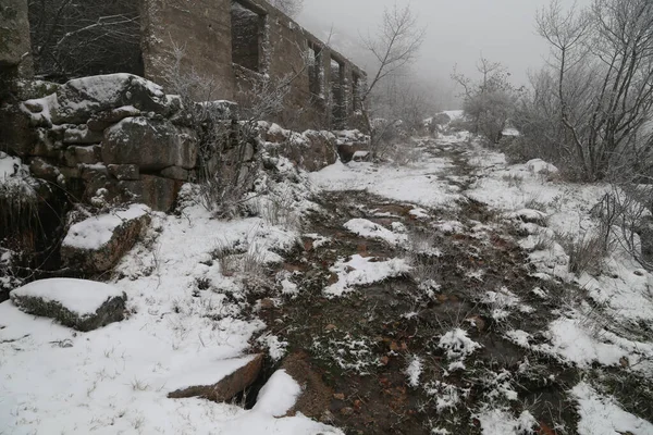 stock image Old house in ruins in the mountains, lots of snow in the north of Portugal