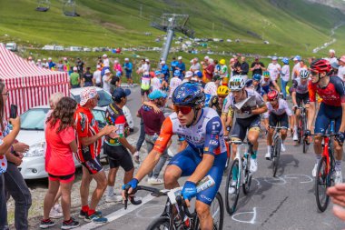 Col du Tourmalet, France: Riders climbig the road to Col du Tourmalet in Pyerenees mountains during the stage 6 of Le Tour de France 2023. clipart