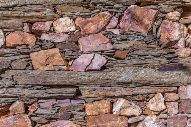 Duvar duvar taşlarının düzensiz desen doku arka plan ile