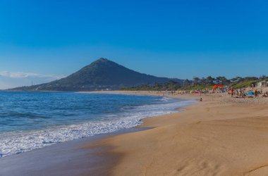 Caminha, Portugal: People at the Moledo beach on a summer day. Caminha, Portugal clipart