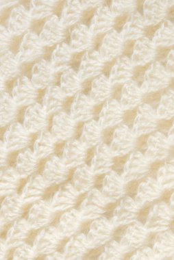 White knitted texture of woolen wool