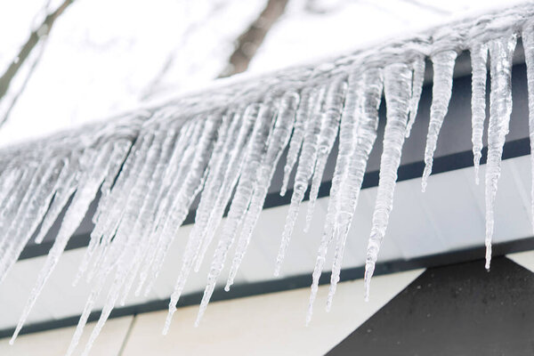 icicles on the roof of the building