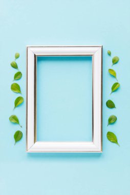 Happy mother's day, women's day or birthday pastel colors background. Floral flat lay minimalism greeting card. Mockup. Beautiful natural flowers on a plain background.