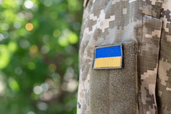 stock image Flag of the army. Ukrainian military uniform, detail.