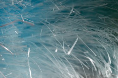 Mavi soyut bir arka planın makro fotoğrafı. Karmaşık düz çizgiler.