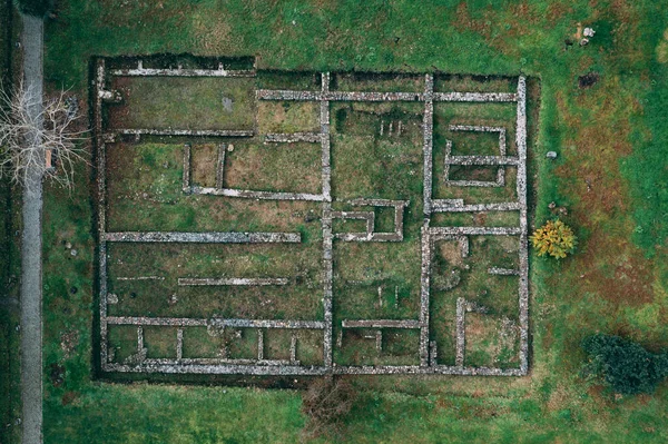 Archaeological excavations of ancient ruins, directly above drone view