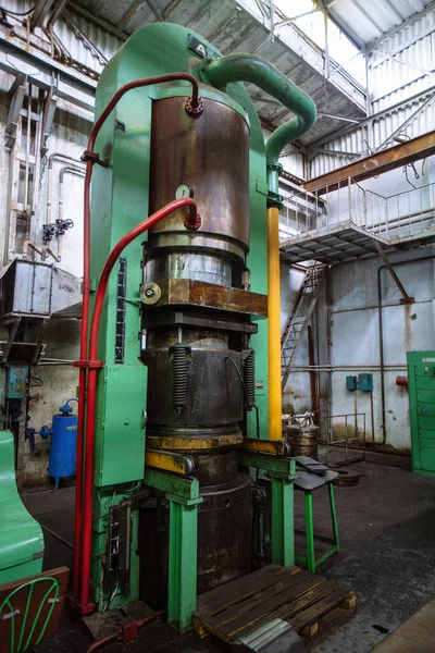 Hydraulic press in the factory workshop.