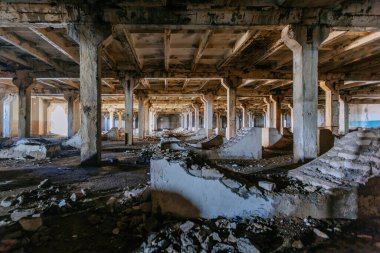 Abandoned factory. Large empty ruined industrial hall.