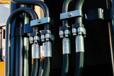Connected hydraulic pressure pipes system of construction machinery.
