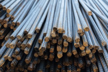 Stack of iron fittings for reinforced concrete, close up.