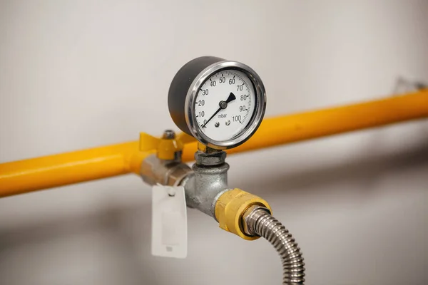 stock image Pipe with pressure gauge, close up, selective focus.