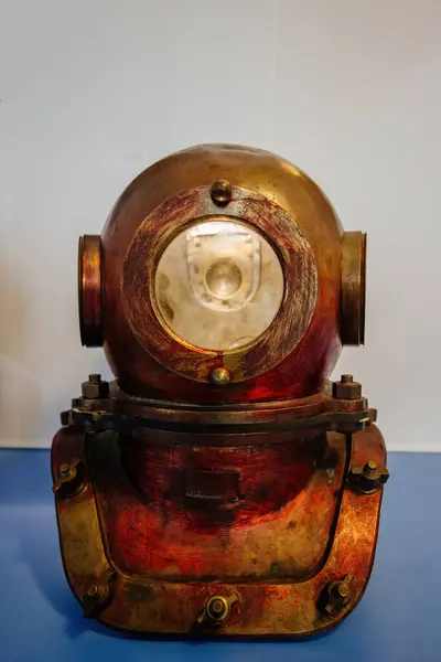 Old vintage copper diving helmet.