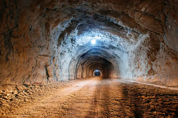Old underground road tunnel inside mountain